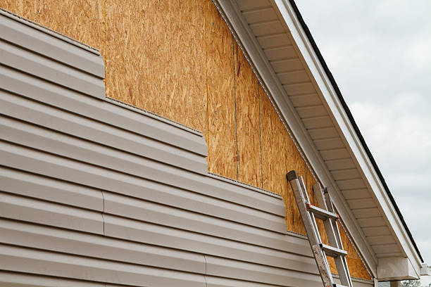 Professional Emergency Siding Repair technician working in Elrama, PA
